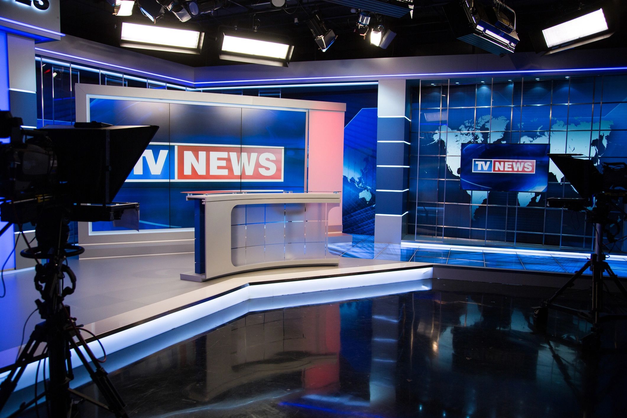 Newsroom with journalists reporting on government transparency